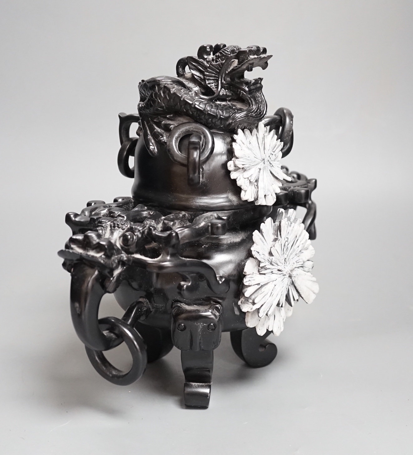 A large decorative Chinese black hardstone tripod censer and cover - 25.5cm high